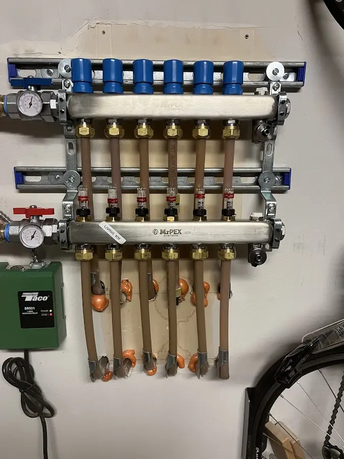 Plumber performing Water Heater Repair at a residential property in Shelton